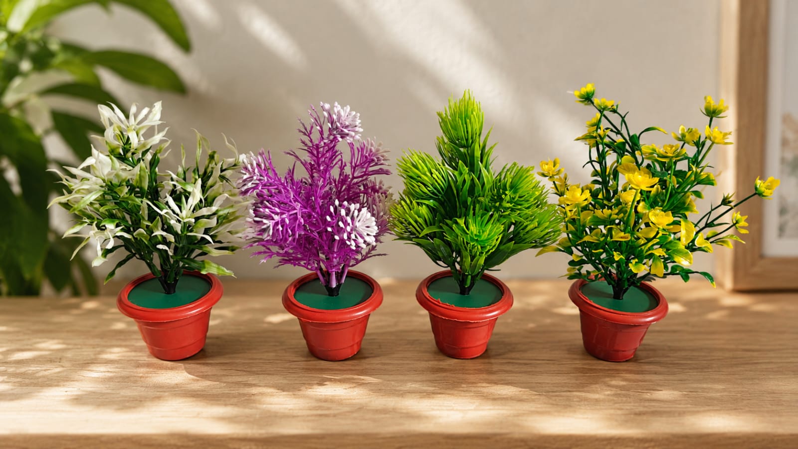 Pack of four artificial plants